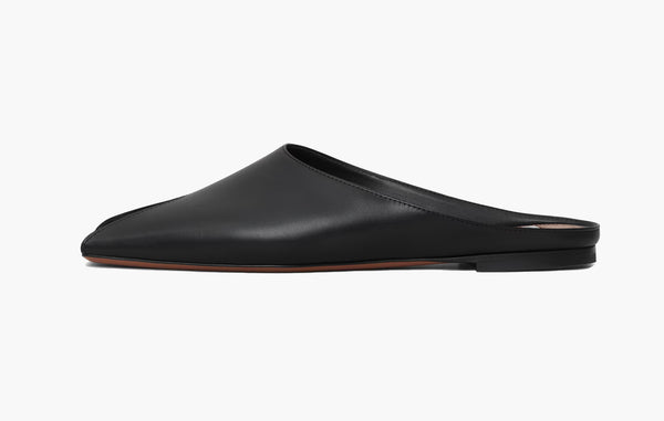 Alaia Spike Flat Mules In Calfskin Black | The Sortage