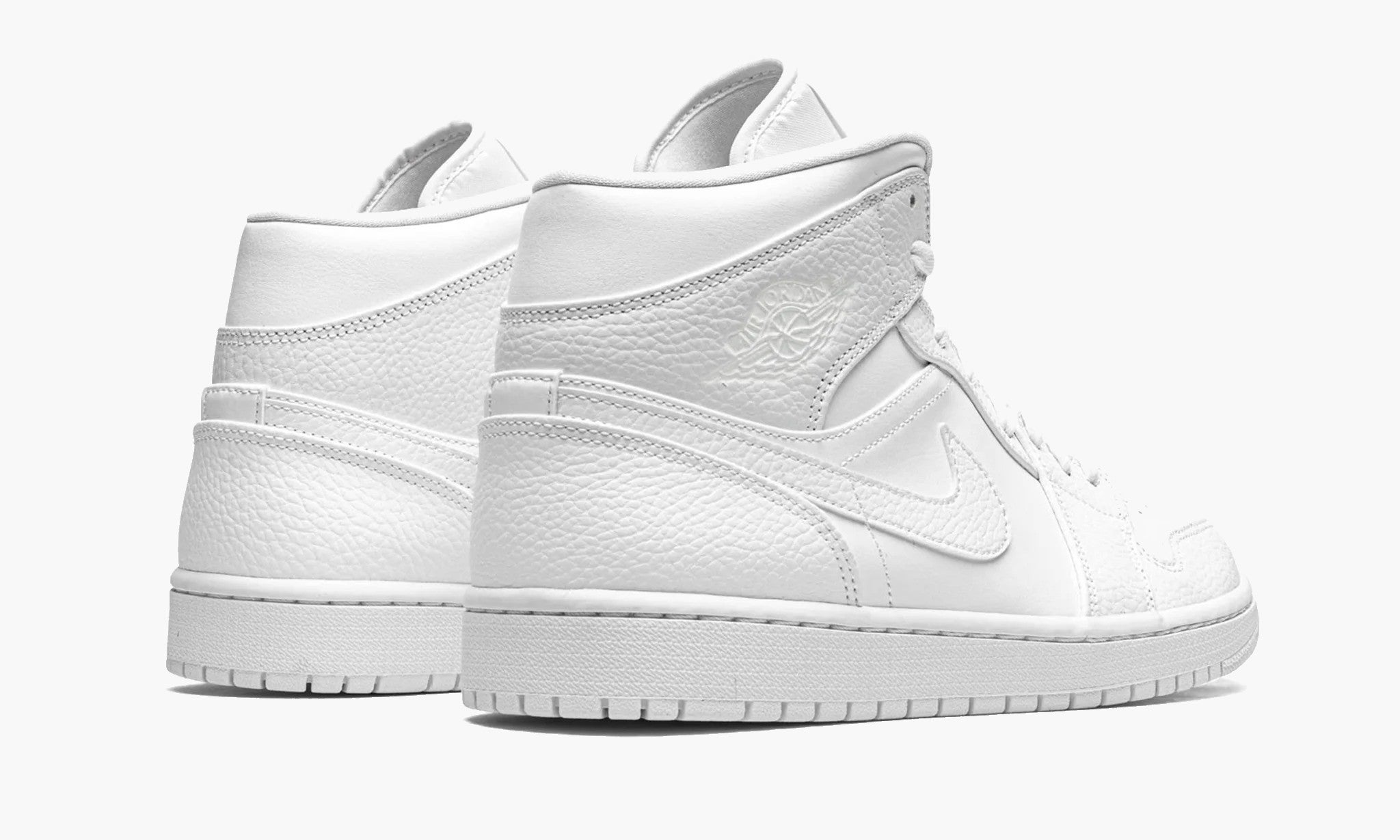 All white low top jordans best sale