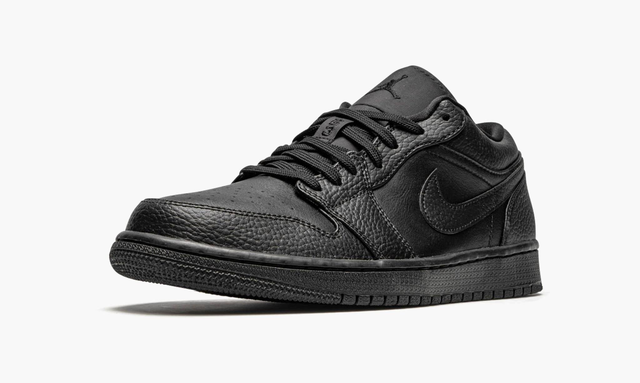 All black low store top jordans