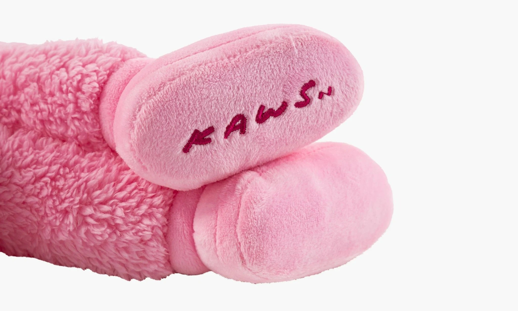 Pink best sale kaws plush