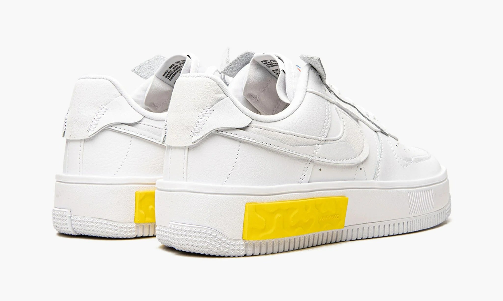 Air force 1 white with yellow swoosh hotsell